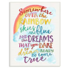 a watercolor painting with the words somewhere over the rainbow skies are blue and the dreams that you dare dream come true