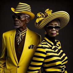 two people dressed in yellow and black are standing next to each other with hats on their heads