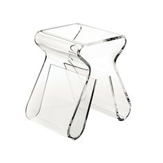 an acrylic chair that is shaped like a curved piece of furniture with legs