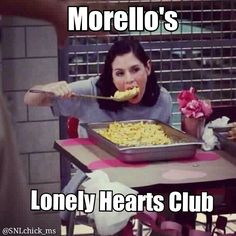 a woman sitting at a table with a pan of food in front of her and the caption reads, morello's lonely hearts club