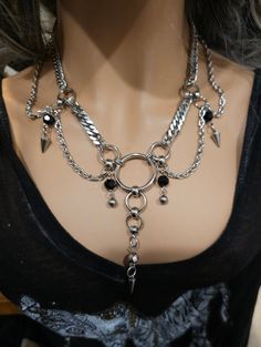 Handmade Chunky Stainless Steel Chunky Chain Gothic Edwardian style Choker Layered Necklace Set, a stunning piece of alternative punk fashion that will elevate any outfit with its bold and edgy look. This necklace features  strands of different chain styles and spikes, and it can be worn at various lengths due to the built-in extender. It runs from approximately 15 inches to 18 inches. it is all stainless steel so it is completely waterproof and will NEVER tarnish. The layered design of this necklace set makes it a versatile accessory that can be worn with a variety of outfits, from casual jeans and t-shirts to formal dresses and evening wear. Its adjustable length allows it to be worn as a choker or a longer necklace, depending on your preference.   Makes a great gift for the special woma Layered Goth Necklace, Chunky Necklace Outfit, Victorian Dark Academia, Chunky Jewelry Necklace, Punk Mode, Necklace Aesthetic, Festoon Necklace, Mode Punk, Goth Necklace