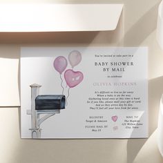 a baby shower by mail card with balloons