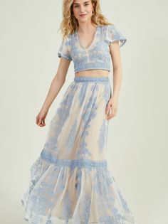 Step into the spotlight with this captivating floral embroidered maxi skirt, where every detail tells a story of timeless beauty. Paired seamlessly with the matching embroidered top, this ensemble radiates a sense of effortless elegance. Embroidered Skirt Outfit, Blouse Jeans, Embroidered Skirt, White Floral Dress, Plus Size Shopping, Skirted Swimwear, Spring Wardrobe, Bottom Clothes, Embroidered Top