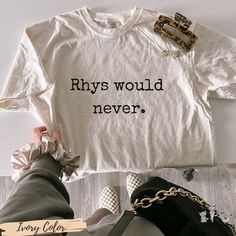 Rhys Would Never  I ACOTAR shirt I Sarah J Maas Licensed SJM merch I Feyre and Rhysand I Bookish Fandom 🌙 ⭐ Officially Licensed Sarah J. Maas Merchandise ACOTAR Collection ⭐ 🌙  Rhys Would Never ACOTAR merch for all SJM fans. Rhys Would Never design for Comfort colors graphic shirt, a fully customizable tee made 100% with ring-spun cotton. The soft-washed, garment-dyed fabric brings extra coziness to your wardrobe while the relaxed fit makes it an excellent daily choice. The double-needle stitching throughout the tee makes it highly durable while the lack of side-seams helps the shirt retain its tubular shape. .: 100% ring-spun cotton .: Medium fabric (6.1 oz/yd² (206.8 g/m .: Relaxed fit .: Sewn-in twill label From A Court of Thorns and Roses, by Sarah J. Maas, © 2015. Artwork by Veselin Bookish Merch Ideas, Acotar Cricut Ideas, Acotar Shirt Ideas, Book Merch Ideas, Acotar Party Ideas, Acotar Tshirt, Acotar Clothes, Acotar Outfits