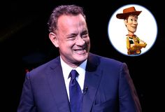 a man in a suit and tie is smiling at the camera with toy story character behind him