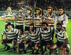 a group of men standing on top of a soccer field