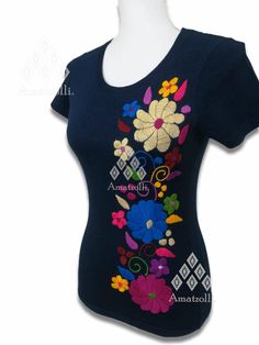 Beautiful Mexican T-shirt. Embroidered by our Chiapanecas artisans by hand on multi-colored cotton. Handcrafted design work where embroidery colors can vary from piece to piece. Material: cotton. Hand multicolored embroidery. Sizes: small, medium, big and extra large. Primary colors: multiple colors. The availability of colors and sizes is limited, images are just examples to illustrate the shape it has. Please ask to be given a photo of the colors we have in stock for your selection when making Outfits Mexicanos, Mexican T Shirts, Shirt Model, Embroidered Shirt, Design Working, Multiple Colors, Cotton Shirt, Womens Clothing Tops, Primary Colors