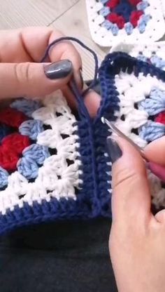 someone is crocheting together with scissors and yarn