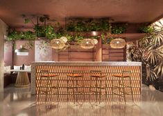 an indoor bar with wicker stools and hanging plants