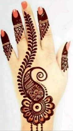 a henna design on the palm of someone's hand