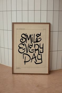 a framed poster with the words smile every day