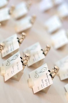 Our Place card Holders made from Lego Stormtroopers, miscellaneous lego pieces for a base and business card paper. Lego Wedding, Place Holders, Big Lego, Lego Display