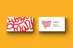 two business cards with red and white designs on them, one has the word happy mom