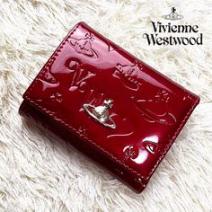 ◉ Vivienne Westwood Gamaguchi Trifold Wallet Color/Red orb New JPN [condition] New, unused item purchased at an outlet store [List price] $205 [Product number] 13vv110 [Color] Red [Material] Embossed enamel [Size] Height 9 x Width 11 x Thickness 3 (cm) [specification] Billfold x 1 Coin purse x 1 Card pocket x 6 (side x 2) ID pocket x 1 Product color and design may vary depending on lighting. Although this item is new and unused, please be aware that since it is an outlet item, there may be slight scratches or dirt from shipping or storage. ◇ What is an outlet product? Genuine outlet products include leather, fabric, metal, etc., which have scratches and stains that do not cause problems in use, poor stitching, off-season products, overproduced dead stock products, low-priced boutique model Red Leather Wallet, Vivienne Westwood Purse, Vivienne Westwood Wallet, Converse Design, Wood Wallet, Vivienne Westwood Bags, Accessory Inspo, Designer Wallet, Red Purse