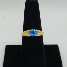 This dazzling 1.31ct Titanic blue Topaz ring is surely stunning with its gorgeous blue flashes. And placed into a beautiful 24k Vermeil band to further enhance the beautiful blue color of the gem. Band: 24k Vermeil gold  Setting: Prong  Size: US/7.25 (Ask about resizing if needed) Gem: 1.31ct Titanic blue Topaz (Natural) Cut: Round  Color: Titanic blue  Clarity: VVS All the gems in my products are gifts given from our great mother earth 🌎, and placed into the finest metals found around the world. With that being said most precious metals such as Sterling silver/Gold are still considered softer metals and should be treated with care! With the proper storage and maintenance your timeless piece of jewelry can last multiple lifetimes. If you have any questions or concerns please feel free to Great Mother, Solitaire Rings, Rock Bottom, Blue Topaz Ring, Topaz Ring, Titanic, Solitaire Ring, Mother Earth, Beautiful Blue