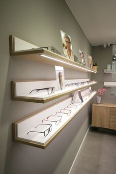 some shelves with glasses on them in a room