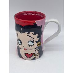 a coffee mug with a cartoon character on it