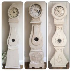 three white clocks sitting next to each other