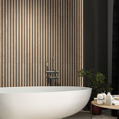 Slatted wall panels are hugely on trend right now, so why not treat your space to an upgrade with our luxury Forest Slat Wood tiles? They’re the perfect choice to add texture and depth to any wall - whether you’re looking to create an eye-catching fireplace, a stylish TV wall or a welcoming hallway. And unlike veneered wood panels, these tiles can be safely laid on wet walls around showers and baths - they’re made from premium ceramic, which is waterproof and easy to keep clean. Each tile measur Wood Panel Bathroom, Wall Panel Ideas, Wooden Wall Tiles, Slat Wood Wall, Porcelain Superstore, Slat Walls, Wood Wall Tiles, Designer Tiles, Grey Floor Tiles