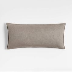 the linen pillow cover is made from light grey fabric