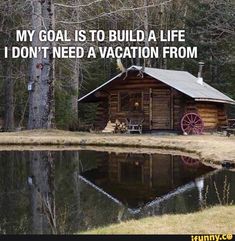 a log cabin sitting in the middle of a forest next to a lake with a quote on it