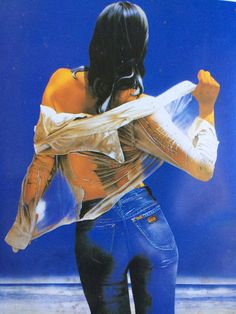 a painting of a woman in blue jeans