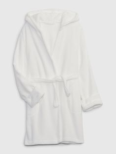 This robe is made with 100% recycled polyester.  Less waste in the world.  More great clothes  for you.  Soft fuzzy knit.  Hood.  Long sleeves.  Tie belt at waist.  Front slant pockets.  Loose fit.  Relaxed, loose fit.  For more fit and sizing info, check out our Size Guide. Robe With Hood, Fuzzy Robe, Kids Robes, Knitted Hood, Belt Tying, Gap Kids, Girls Pajamas, Tie Belt, Size Guide