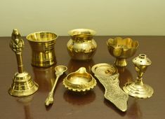 there are many brass items on the table
