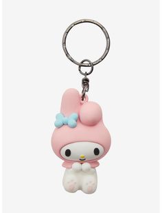 a hello kitty keychain with a bow on it's head is shown