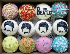 the beatles cupcakes are decorated with sprinkles