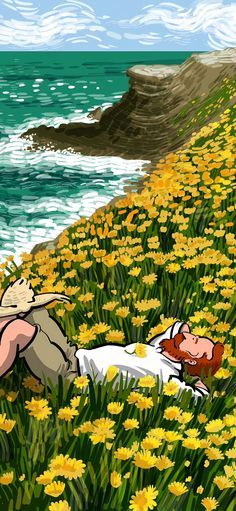 a man laying on top of a field of yellow flowers next to the ocean