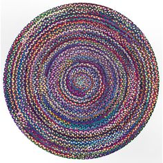 a round rug made out of multicolored yarns on a white background with the center