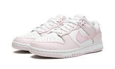 The Women’s Nike Dunk Low “Pink Paisley” is a women’s-exclusive colorway of the retro basketball shoe with a springtime-inspired appearance.  The versatile “Pink Paisley” features a white leather base with contrasting pink leather overlay panels.  Nike switches up the look of the shoe with a pink paisley Swoosh on either side.  Classic “Nike” branding is embroidered on the heel and printed on the tongue tag.  The shoe’s white rubber midsole is matched with a pink outsole.  Release date: February Nike Dunk Low Pink Paisley, Pink Paisley Dunks, Pink Aesthetic Shoes, Pink Shoes Aesthetic, White And Pink Sneakers, Pink Overlays, Womens Dunk Low, Paisley Shoes, Light Pink Shoes