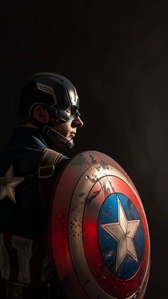 a man dressed as captain america holding a shield in his hand and looking off into the distance