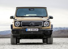 the front end of a beige mercedes benz benz benz benz benz benz benz benz benz benz benz benz benz benz benz benz benz benz