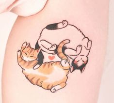 a woman with a cat tattoo on her thigh and the other arm behind her back