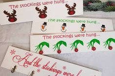 three christmas stocking hangers with funny sayings and snowman faces on them