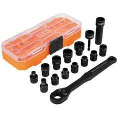 an assortment of tools and fittings in a plastic case with the tool holder open