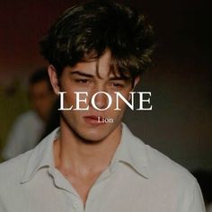 a young man in a white shirt with the word leone on it's left side
