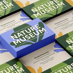 several business cards stacked on top of each other with the words nature museum printed on them