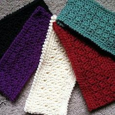 four crocheted headbands are laying on the floor next to each other