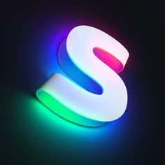 the letter s is lit up in bright colors