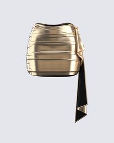 This golden drape skirt is your key to instant glam ✨ Made from lame jersey fabric, and complete with an asymmetrical hem, sash detail, ruching detail, and an elastic waistband - this skirt has a luminous allure perfect for stealing the spotlight anywhere you go 😌 Golden Skirt Outfit, Satin Skirt And Top, Gold Skirt Outfit, Golden Clothes, Gold Skirts, Satin Bustier Top, Golden Skirt, Metallic Outfit, Gold Clothes