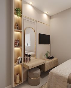 a bedroom with a bed, mirror and dressing table in front of a tv on the wall