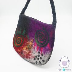 a handbag with flowers painted on it