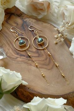 Our new Starlight Labradorite Gold Earrings are our next anticipated bestsellers with stunning flashy Labradorite gems cascading from golden hoops, chain, and beads. A sweet connection to the cosmos the Starlight Earrings represent inner knowing, infinite potential and endless dreams.  Starlight Labradorite Gold Earrings are handcrafted with 14k Goldfilled + Gold Vermeil components, chain, and beads. 14k Gold Vermeil flashy Labradorite bezel. 14k Goldfilled Ear Wire. Hangs 3.625 inches long from Fimo, Long Chain Earrings Gold, Inner Knowing, Bezel Jewelry, Stone Bead Jewelry, Golden Hoops, Mystical Jewelry, Jewelry Photoshoot, Earrings Inspiration
