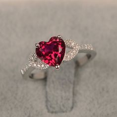 Red ruby ring July birthstone ring heart shape engagement ring white gold ring gold jewelry for woma Ruby Ring Designs, Cute Promise Rings, Heart Shaped Engagement Rings, July Birthstone Ring, Ruby Rings, Necklaces Women, Rings Ideas, Engagement Ring White Gold, Cushion Diamond