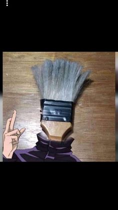 an anime character holding up his finger to the side with a hair brush on it's head