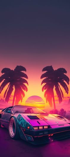 a car parked in front of palm trees at sunset