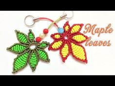 an embroidered keychain with a flower on it and the words maple leaves written in red